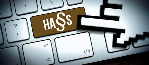 Fotomontage: Computertaste mit der Aufschrift Hass und Paragrafenzeichen