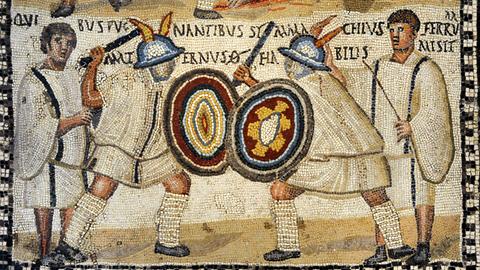 Ein römisches Mosaik aus dem 3. Jahrhundert zeigt Gladiatoren.