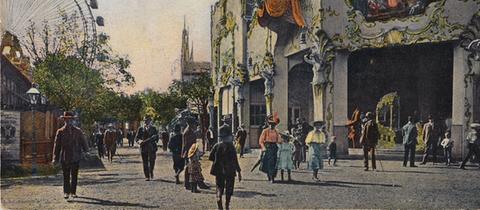Munteres Treiben unterm Riesenrad: Der Wiener Prater auf einer alten kolorierten Postkarte von 1905